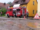 Das Wasser auf der Buchschwabacher Hauptstrae gin...
  